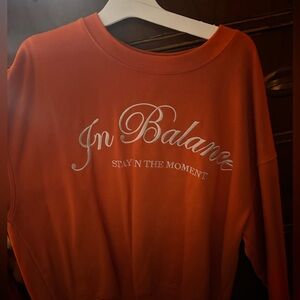 Crew neck colorful in orange semi warm